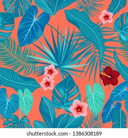 Tropical vector seamless pattern of blue leaves on red color background. Botany design, jungle leaves of palm tree and flowers.