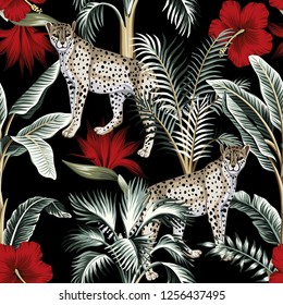 Tropical vintage botanical banana tree, palm tree, red hibiscus flower and leopard floral green palm leaves seamless pattern black background. Exotic jungle wallpaper.