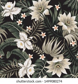 Tropical vintage night white orchid, lotus flower, palm leaves floral seamless pattern black background. Exotic jungle wallpaper.