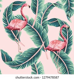 Tropical vintage pink flamingo, green banana leaves floral seamless pattern pink background. Exotic jungle wallpaper.