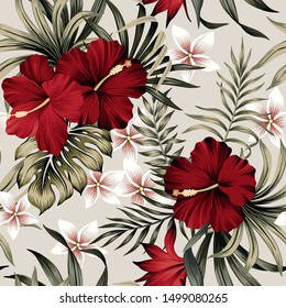 Tropical vintage red hibiscus flower, palm leaves floral seamless pattern  background. Exotic jungle wallpaper.