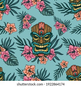 Tropical vintage seamless pattern with polynesian tiki mask hibiscus flowers and exotic leaves vector illustration