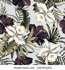 Tropical vintage white orchid, purple hibiscus flower, palm leaves floral seamless pattern grey background. Exotic jungle wallpaper.