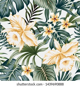 Tropical vintage yellow orchid flower, palm leaves floral seamless pattern grey  background. Exotic jungle wallpaper.