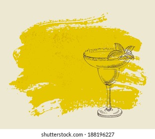 Tropical yellow cocktail with mint on yellow grunge background