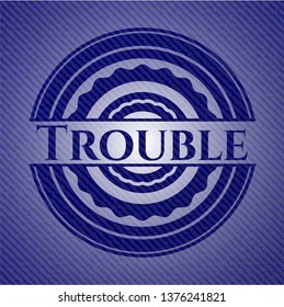 Trouble badge with jean texture