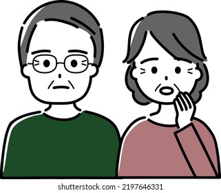 A troubled elderly couple (husband wears glasses)