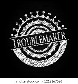 Troublemaker written with chalkboard texture