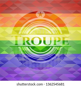 Troupe on mosaic background with the colors of the LGBT flag