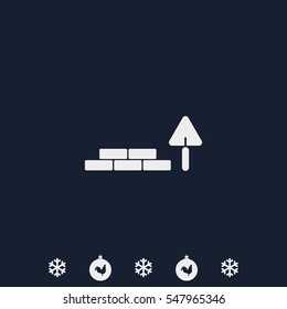 Trowel and brick icon.