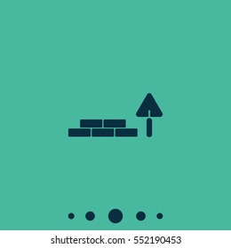 Trowel and brick icon.