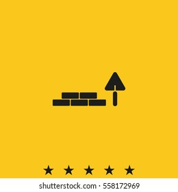 Trowel and brick icon.