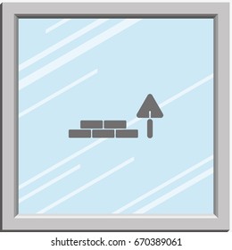 Trowel and brick icon.