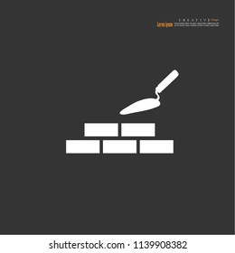 Trowel with brick  icon.vector illustration.