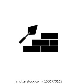 Trowel with brick wall icon