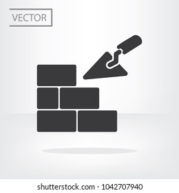 Trowel Building And Brick Wall Icon Vector