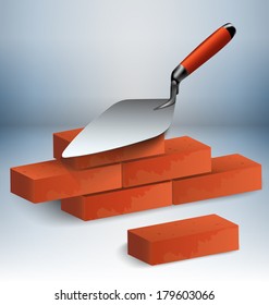 Trowel with a couple of bricks vector illustration