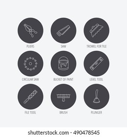 Trowel for tile, saw and brush tool icons.