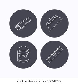 Trowel for tile, saw and level measure icons. Bucket of paint linear sign. Flat icons in circle buttons on white background. Vector