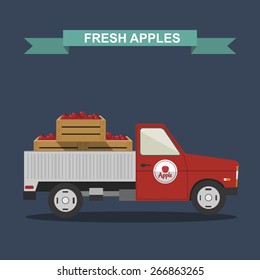 truck with apples in wooden boxes