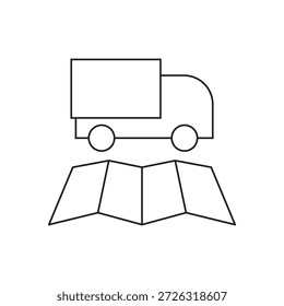 Camión sobre un mapa plegado para la planificación de rutas o navegación.