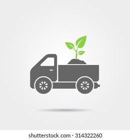 Truck with soil and sprout icon