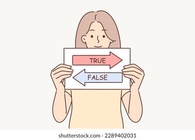 True and false sign in hands of woman calling to make decision and make right choice from two options. Girl demonstrates sheets of paper with arrows with inscriptions true and false