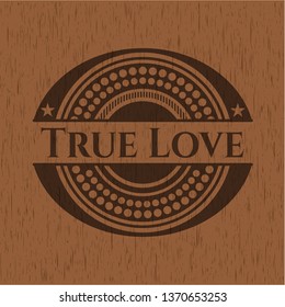 True Love badge with wooden background