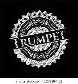 Trumpet on chalkboard