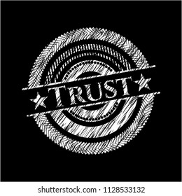 Trust written on a chalkboard
