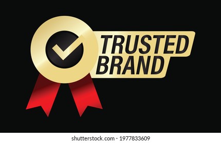 'trusted brand'premium quality golden vector icon with tick mark and ribbons isolated on dark background