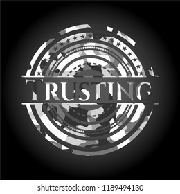 Trusting on grey camouflaged texture