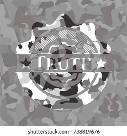Truth on grey camouflaged texture