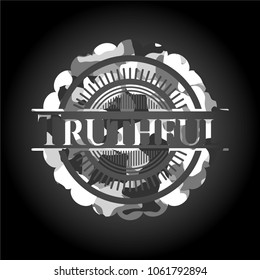   Truthful written on a grey cTruthful on grey camouflage textureamouflage texture