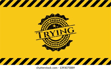 Trying black grunge emblem inside yellow warning sign. Vector Illustration. Detailed.