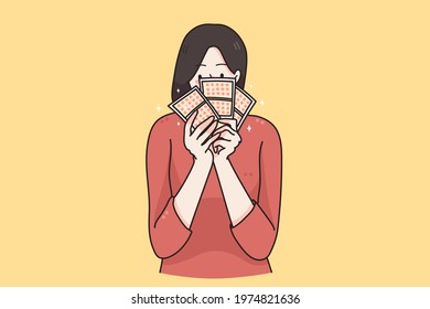 Trying chances in lottery concept. Portrait of emotional young woman cartoon character standing alone with with lottery tickets on yellow background vector illustration 