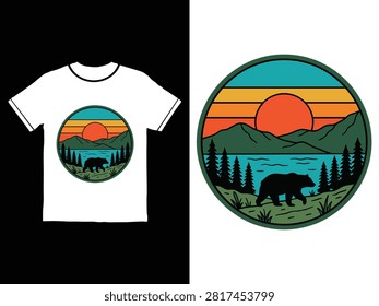 Tshirt with circular graphic showing bear walking near lake and mountains at sunset