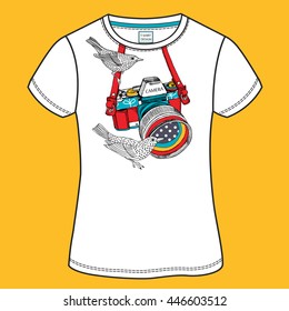 T-shirt design with image of a bright color camera and birds in the folk style. Vector illustration.