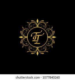 TT Initial logo. Ornament ampersand monogram golden logo black background