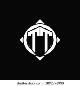 Monograma de TT circunferencia aislada redondeada con forma de brújula sobre fondo negro