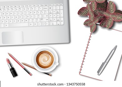 Ttop view of the female office table desk with laptop and office supplies
