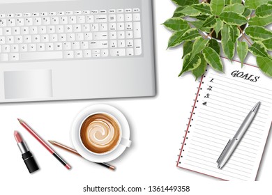 Ttop view of the female office table desk with laptop and office supplies