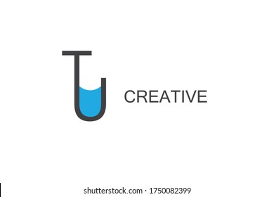 TU logo design with a combination of black and blue water.