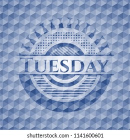 Tuesday blue emblem or badge with geometric pattern background.