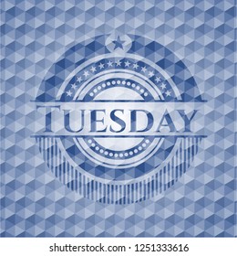 Tuesday blue polygonal badge.