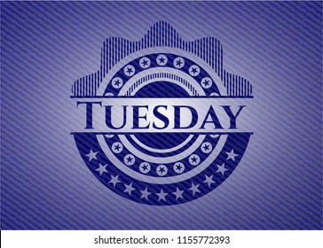 Tuesday emblem with denim high quality background