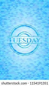 Tuesday light blue emblem with triangle mosaic background