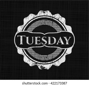 Tuesday written on a chalkboard