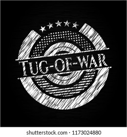 Tug-of-war written on a chalkboard