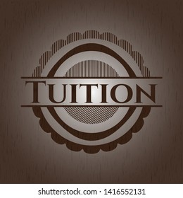 Tuition badge with wood background